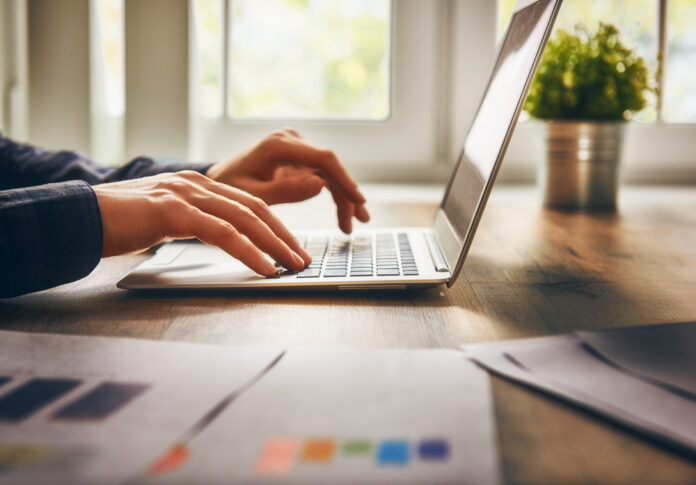 Businessman,Using,Laptop,Computer,Sitting,Working,Office.