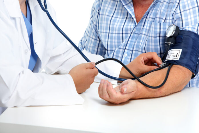 Doctor,Checking,Old,Man,Patient,Arterial,Blood,Pressure.,Health,Care.