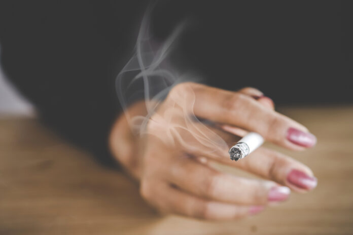 Closeup,Woman,Hand,Smoking,Cigarette,,unhealthy,Lifestyle,Concept